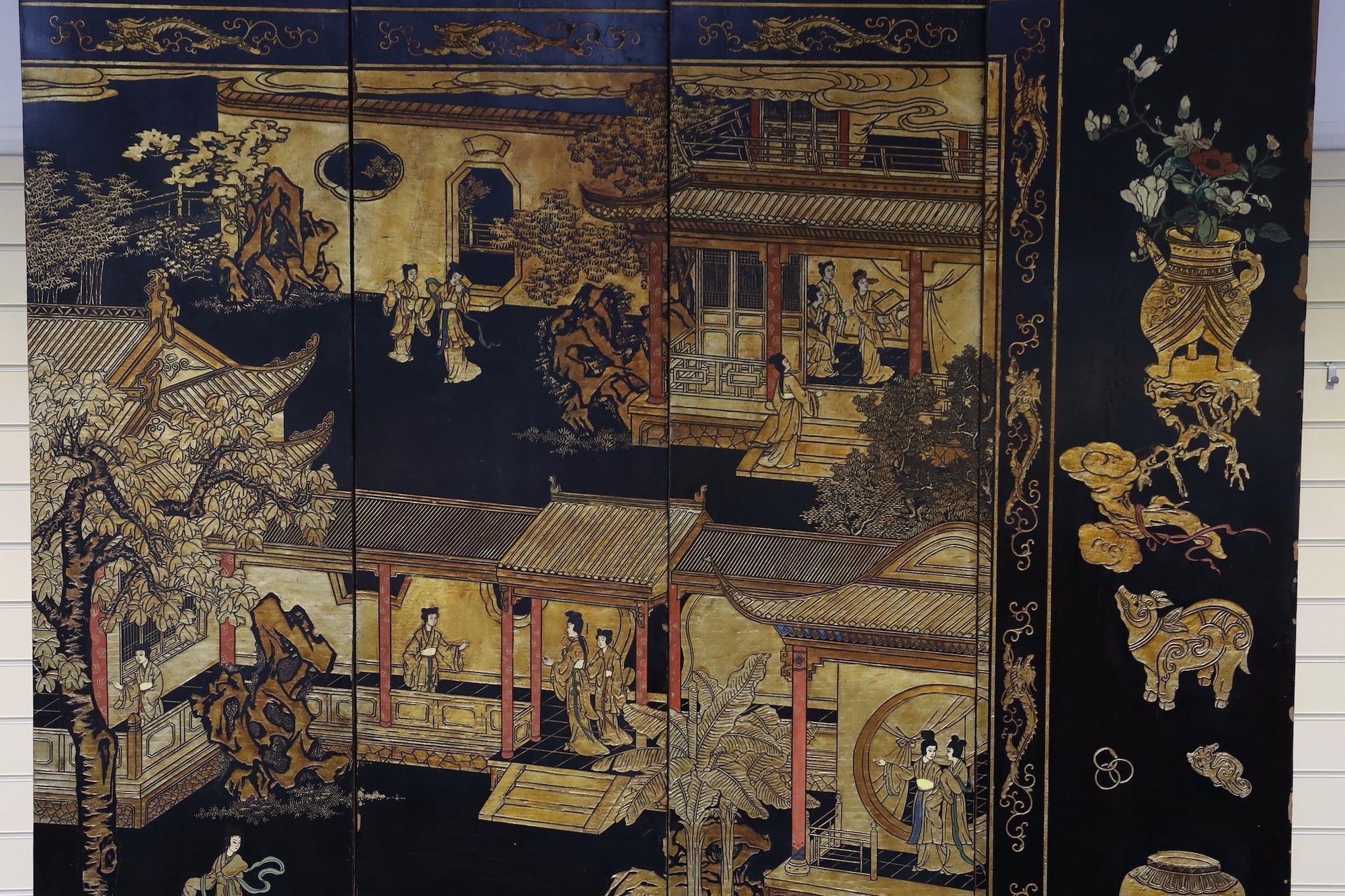 A tall Chinese coromandel lacquer twelve panel screen, 19th century, each leaf panel width 49cm, height 264cm